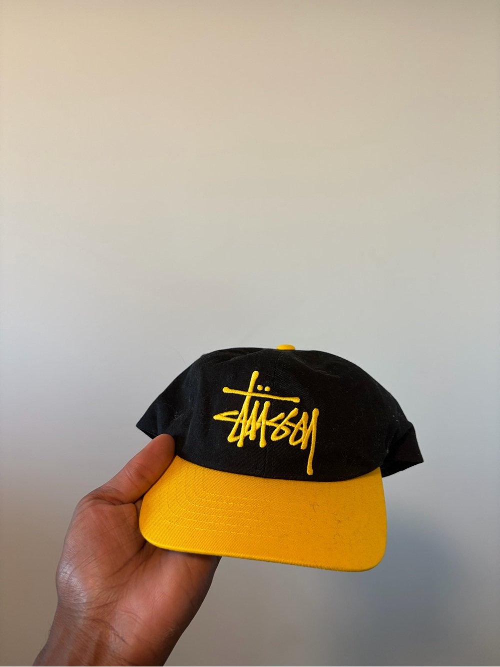 Stussy Black and Yellow Script Logo Cap